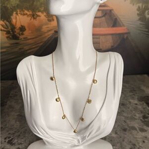 Delicate Gold Necklace with Textured Charms